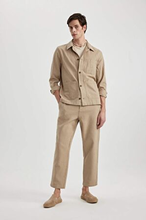 DeFacto Yazlık Jogger Pantolon Regular Fit Normal Kesim Keten Görünümlü Düz Paça Pamuklu Cepli B4138AX24SPBG773