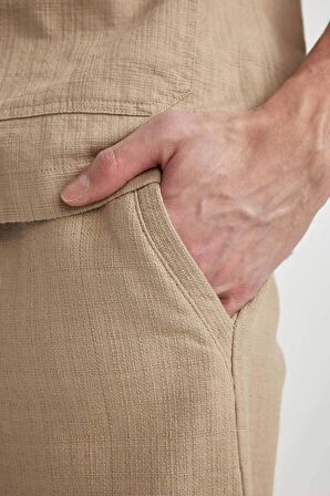 DeFacto Yazlık Jogger Pantolon Regular Fit Normal Kesim Keten Görünümlü Düz Paça Pamuklu Cepli B4138AX24SPBG773
