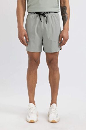 DeFactoFit Slim Fit Dar Kesim Sporcu Dokuma Şort C0318AX24SPGN920