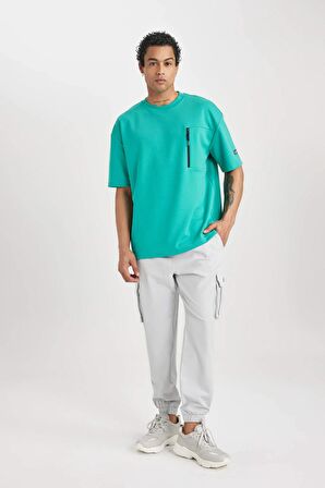 DeFactoFit Sporcu Jogger Eşofman Altı Standart Fit Kargo Cepli Dokuma Beli Paçası Lastikli C0043AX24SPBG143