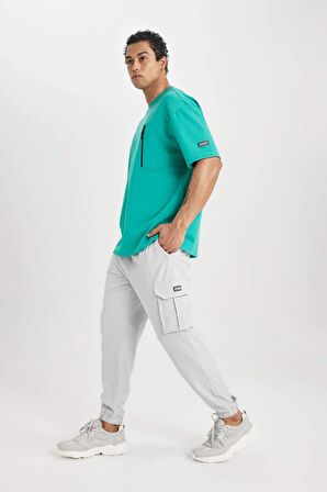 DeFactoFit Sporcu Jogger Eşofman Altı Standart Fit Kargo Cepli Dokuma Beli Paçası Lastikli C0043AX24SPBG143
