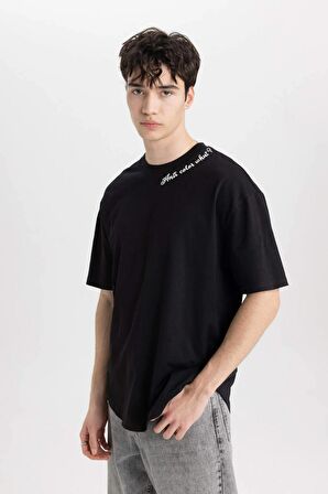 DeFacto Boxy Fit Bisiklet Yaka Yaka Baskılı Baskılı Kısa Kollu Tişört C2135AX24SMBK81