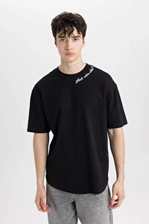 DeFacto Boxy Fit Bisiklet Yaka Yaka Baskılı Baskılı Kısa Kollu Tişört C2135AX24SMBK81