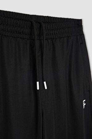 DeFactoFit Sporcu Jogger Eşofman Altı Slim Fit Dar Kesim Fermuarlı Paça B5029AX24SPBK81