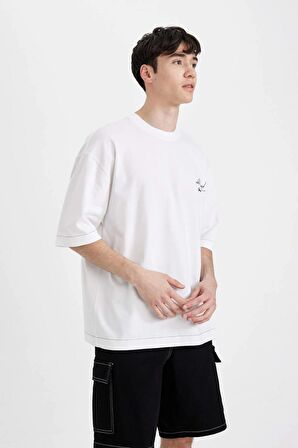 DeFacto Loose Fit Bisiklet Yaka Sırt Baskılı Kısa Kollu Tişört C2488AX24SMWT34