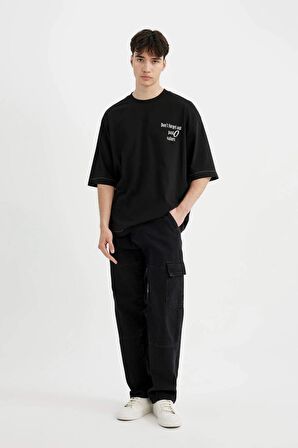 DeFacto Loose Fit Bisiklet Yaka Sırt Baskılı Kısa Kollu Tişört C2244AX24SMBK81