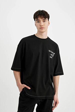 DeFacto Loose Fit Bisiklet Yaka Sırt Baskılı Kısa Kollu Tişört C2244AX24SMBK81