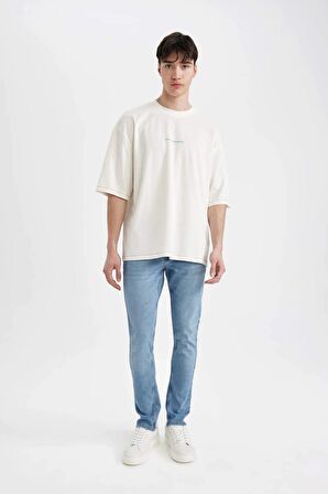 DeFacto Loose Fit Bisiklet Yaka Sırt Baskılı Kısa Kollu Tişört C2732AX24SMER105