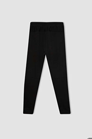 DeFactoFit Slim Fit Sporcu Jogger Eşofman Altı Dar Kesim Skuba Dalgıç Kumaş Standart Paça Beli Bağcıklı Lastikli Paça Z9112AZ24AUBK81