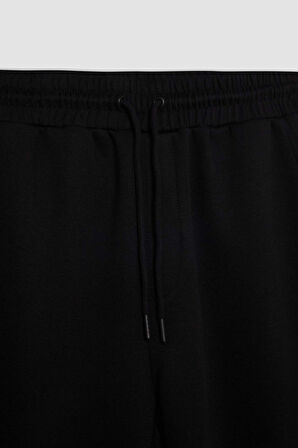 DeFactoFit Slim Fit Sporcu Jogger Eşofman Altı Dar Kesim Skuba Dalgıç Kumaş Standart Paça Beli Bağcıklı Lastikli Paça Z9112AZ24AUBK81