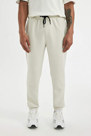 DeFactoFit  Slim Fit Sporcu Jogger Eşofman Altı Dar Kesim Skuba Dalgıç Kumaş Standart Paça Beli Bağcıklı Lastikli Paça Z9112AZ24AUBG721