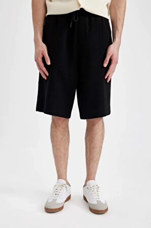 DeFacto %100 Pamuk Relax Fit Cepli Basic Düz Bermuda Şort C7589AX24SMBK81