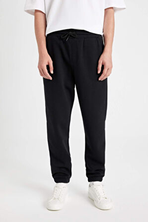 DeFacto Regular Fit Jogger Eşofman Altı Cepli Beli Paçası Lastikli X8286AZ24AUBK81