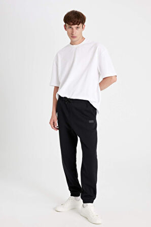 DeFacto Regular Fit Jogger Eşofman Altı Cepli Beli Paçası Lastikli X8286AZ24AUBK81