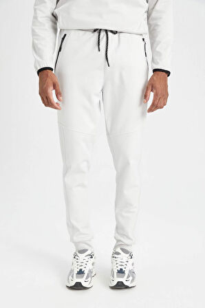 DeFactoFit Sporcu Jogger Eşofman Altı Slim Fit Dar Kesim Skuba Dalgıç Kumaş Beli Bağcıklı Lastikli Paça Cepli A6965AX24AUGR493