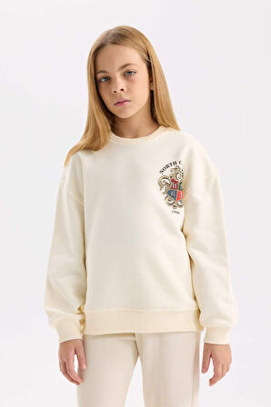 DeFacto Kız Çocuk Relax Fit Bisiklet Yaka Baskılı İçi Yumuşak Tüylü Sweatshirt D4272A824WNER233