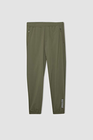 DeFactoFit Dokuma Esnek Multifonksiyonel Sporcu Jogger Eşofman Altı Slim Fit Dar Kesim Çift Cepli C1212AX24AUKH457