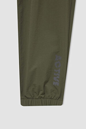 DeFactoFit Dokuma Esnek Multifonksiyonel Sporcu Jogger Eşofman Altı Slim Fit Dar Kesim Çift Cepli C1212AX24AUKH457
