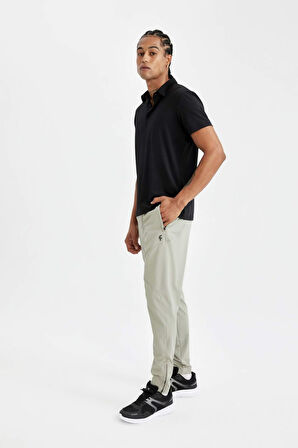DeFactoFit Sporcu Dokuma Pantolon Slim Fit Dar Kesim Çift Cepli Fermuarlı Paça C9262AX24AUKH418