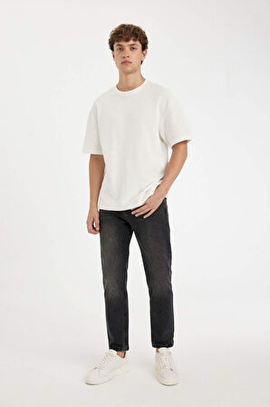 DeFacto %100 Pamuk 90's Slim Fit Dar Kalıp Yüksek Bel Dar Paça Siyah Jean Pantolon D6612AX24AUNM40