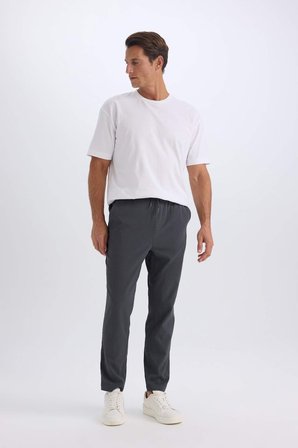 DeFacto Relax Fit Rahat Kesim Düz Paça Krinkıl Yazlık Kumaş Pantolon C3930AX25SPAR15