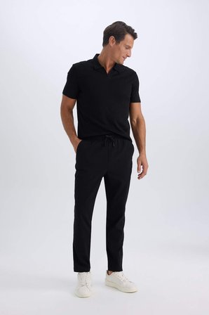 DeFacto Relax Fit Rahat Kesim Düz Paça Krinkıl Yazlık Kumaş Pantolon C3930AX25SPBK27