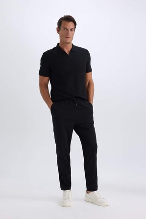 DeFacto Relax Fit Rahat Kesim Düz Paça Krinkıl Yazlık Kumaş Pantolon C3930AX25SPBK27