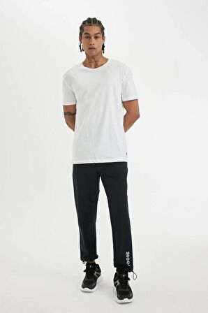 DeFactoFit  Sporcu Jogger Eşofman Altı Slim Fit Dar Kesim Çift Cepli Dokuma C2833AX24SMBK81