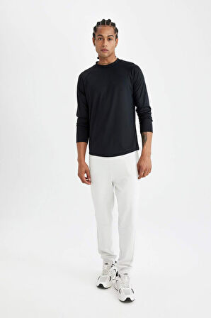DeFactoFit Slim Fit Dik Yaka Baskılı Uzun Kollu Sporcu Tişört C9493AX24AUBK81
