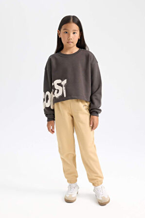 DeFacto Kız Çocuk Standart Fit Beli Paçası Lastikli Baskılı Jogger Eşofman Altı D2295A824WNBG68