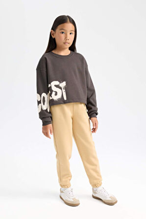 DeFacto Kız Çocuk Standart Fit Beli Paçası Lastikli Baskılı Jogger Eşofman Altı D2295A824WNBG68