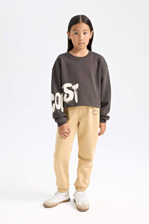 DeFacto Kız Çocuk Standart Fit Beli Paçası Lastikli Baskılı Jogger Eşofman Altı D2295A824WNBG68