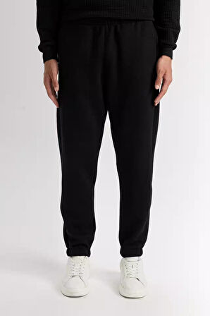 DeFactoFit Sporcu Jogger Eşofman Altı Standart Fit Beli Paçası Lastikli Basic Düz Cepli D0753AX24AUBK81