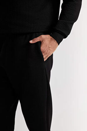 DeFactoFit Sporcu Jogger Eşofman Altı Standart Fit Beli Paçası Lastikli Basic Düz Cepli D0753AX24AUBK81