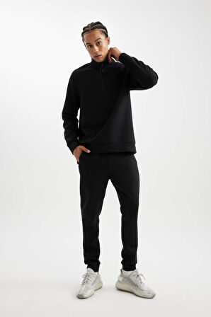 DeFactoFit Sporcu Jogger Eşofman Altı Slim Fit Dar Kesim Skuba Dalgıç Kumaş Standart Paça C0485AX24AUBK81