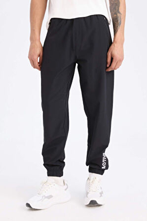 DeFactoFit Slim Fit Dokuma Sporcu Jogger Eşofman Altı Dar Kesim Çift Cepli