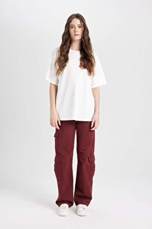 DeFacto Coool Beetlejuice Oversize Geniş Kalıp Bisiklet Yaka Sırt Baskılı Kısa Kollu Tişört D8361AX24AUWT32