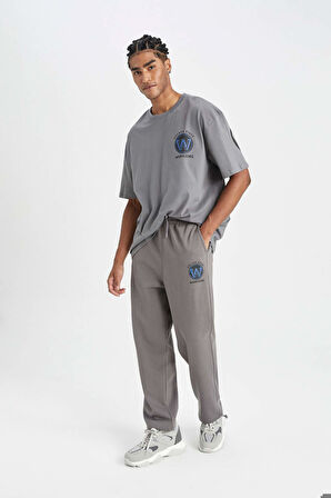 DeFactoFit NBA Golden State Warriors Jogger Eşofman Altı Wide Straight Cepli Düz Paça C9260AX24AUGR211