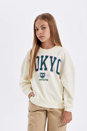 DeFacto Kız Çocuk Oversize Geniş Kalıp Bisiklet Yaka Baskılı Sweatshirt C7461A824AUER99