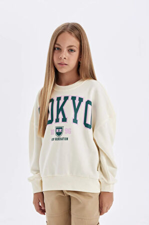 DeFacto Kız Çocuk Oversize Geniş Kalıp Bisiklet Yaka Baskılı Sweatshirt C7461A824AUER99