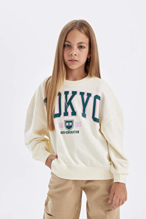 DeFacto Kız Çocuk Oversize Geniş Kalıp Bisiklet Yaka Baskılı Sweatshirt C7461A824AUER99