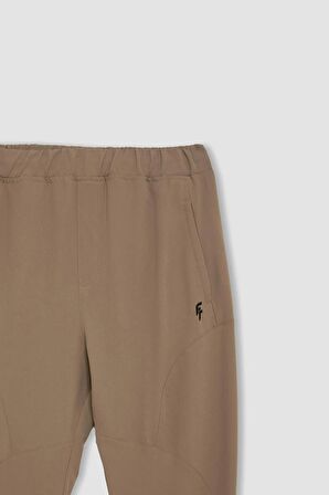 DeFactoFit Sporcu Jogger Eşofman Altı Slim Fit Dar Kesim Dokuma Üç Cepli Fermuarlı Paça B2780AX24SMBG315