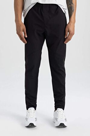 DeFactoFit Sporcu Jogger Eşofman Altı Slim Fit Dar Kesim Dokuma Üç Cepli Fermuarlı Paça B2780AX24SMBK81
