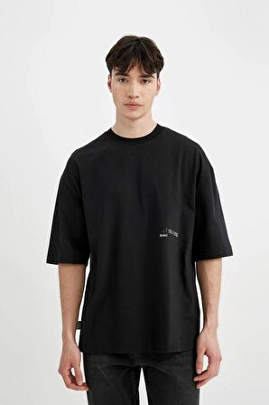 DeFacto Loose Fit Bisiklet Yaka Sırt Baskılı Kısa Kollu Tişört C1868AX24SMBK81