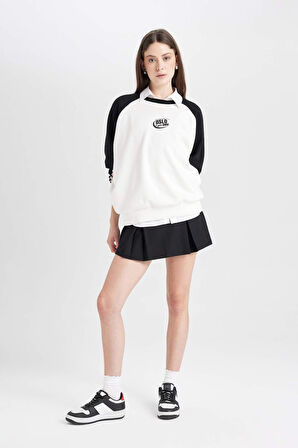DeFacto Coool Loose Fit Biisklet Yaka Renk Bloklu Baskılı Sweatshirt D6673AX24WNBK81