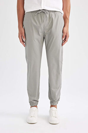 DeFacto Yazlık Pamuklu Jogger Pantolon Basic Düz Beli Bağcıklı Cepli Lastikli Paça D7782AX24AUKH474