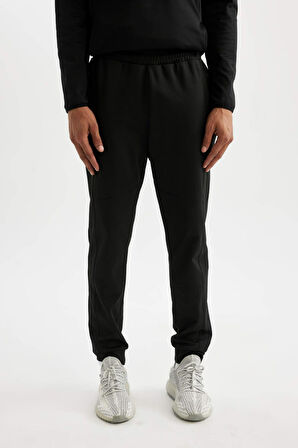 DeFactoFit Jogger Eşofman Altı Slim Fit Dar Kesim Skuba Dalgıç Kumaş Standart Paça D1951AX24AUBK81