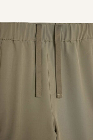 DeFactoFit Sporcu Jogger Eşofman Altı Slim Fit Dar Kesim Dokuma Kargo Cepli Standart Paça D3884AX24WNKH465