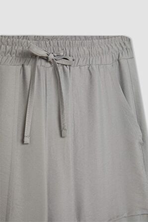DeFacto Wide Leg Dökümlü Kumaş Pantolon Beli Lastikli Bağcıklı Geniş Bol Paça Cepli Yüksek Bel Uzun Boy Paça Yırtmaçlı A9212AX24SMGR454