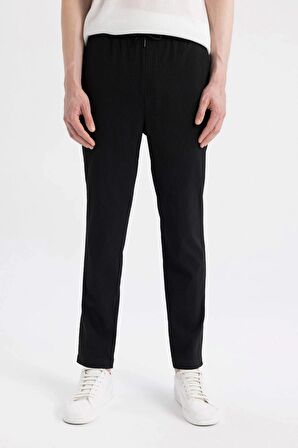 DeFacto Relax Fit Rahat Kesim Düz Paça Krinkıl Yazlık Kumaş Pantolon C3930AX24SMBK27